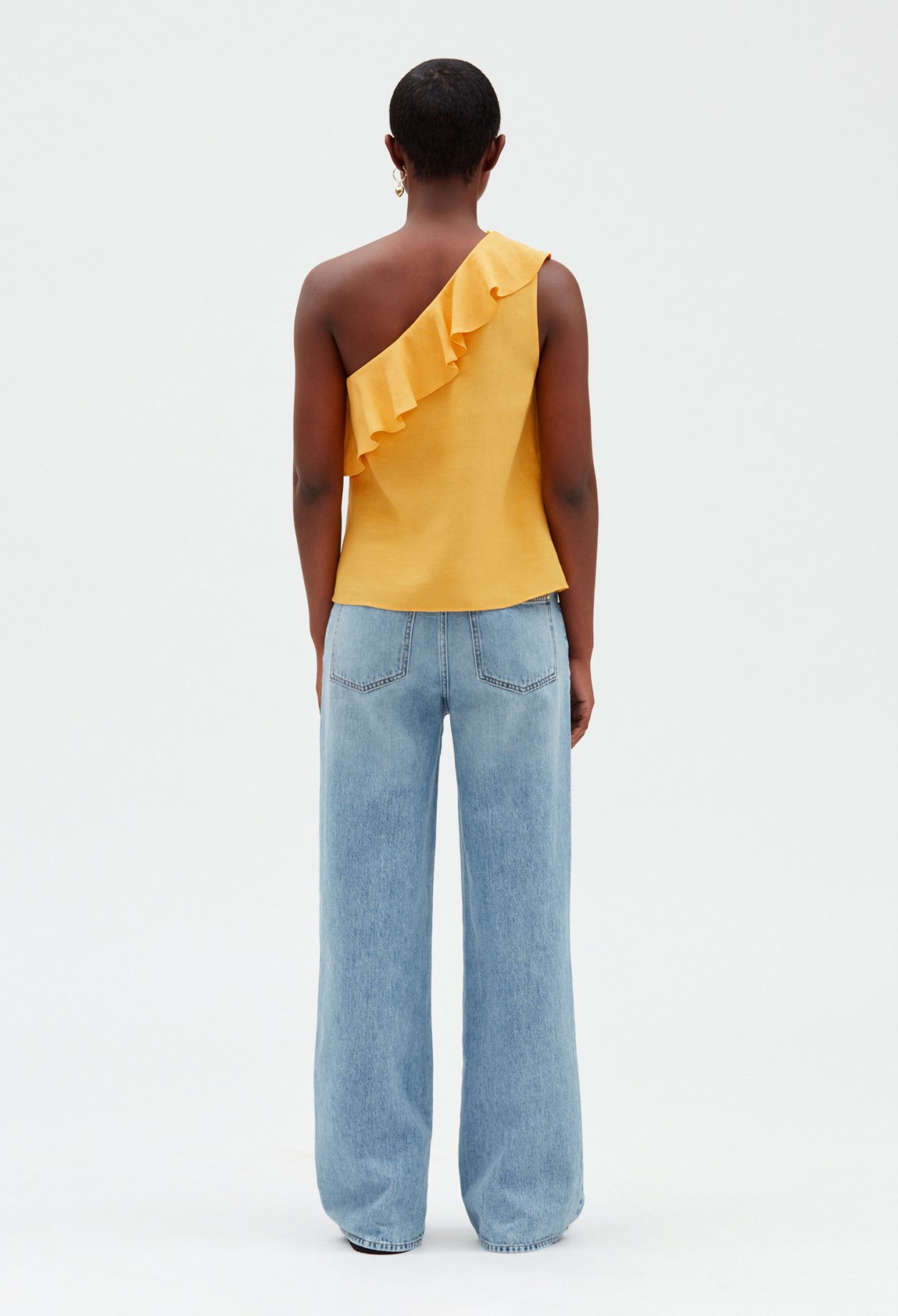 Top asymetrique jaune