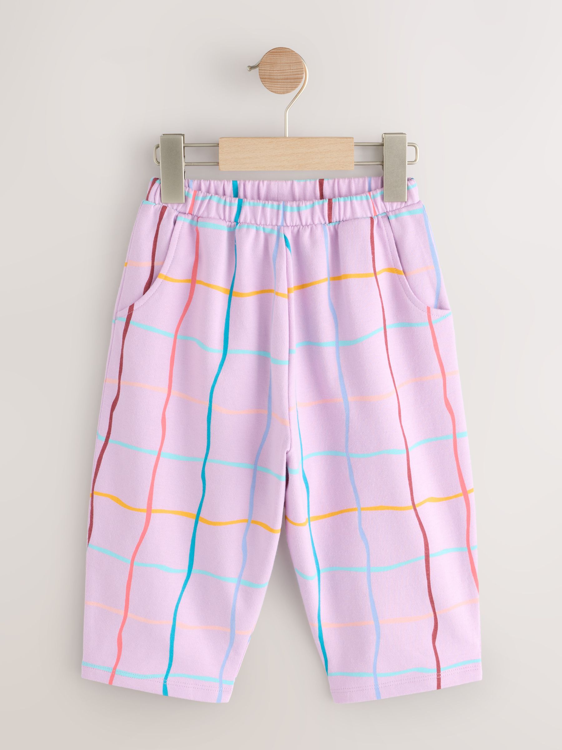 Lilapaars geruit - Broek met structuur en wijde kortere pijpen (3mnd -7jr)
