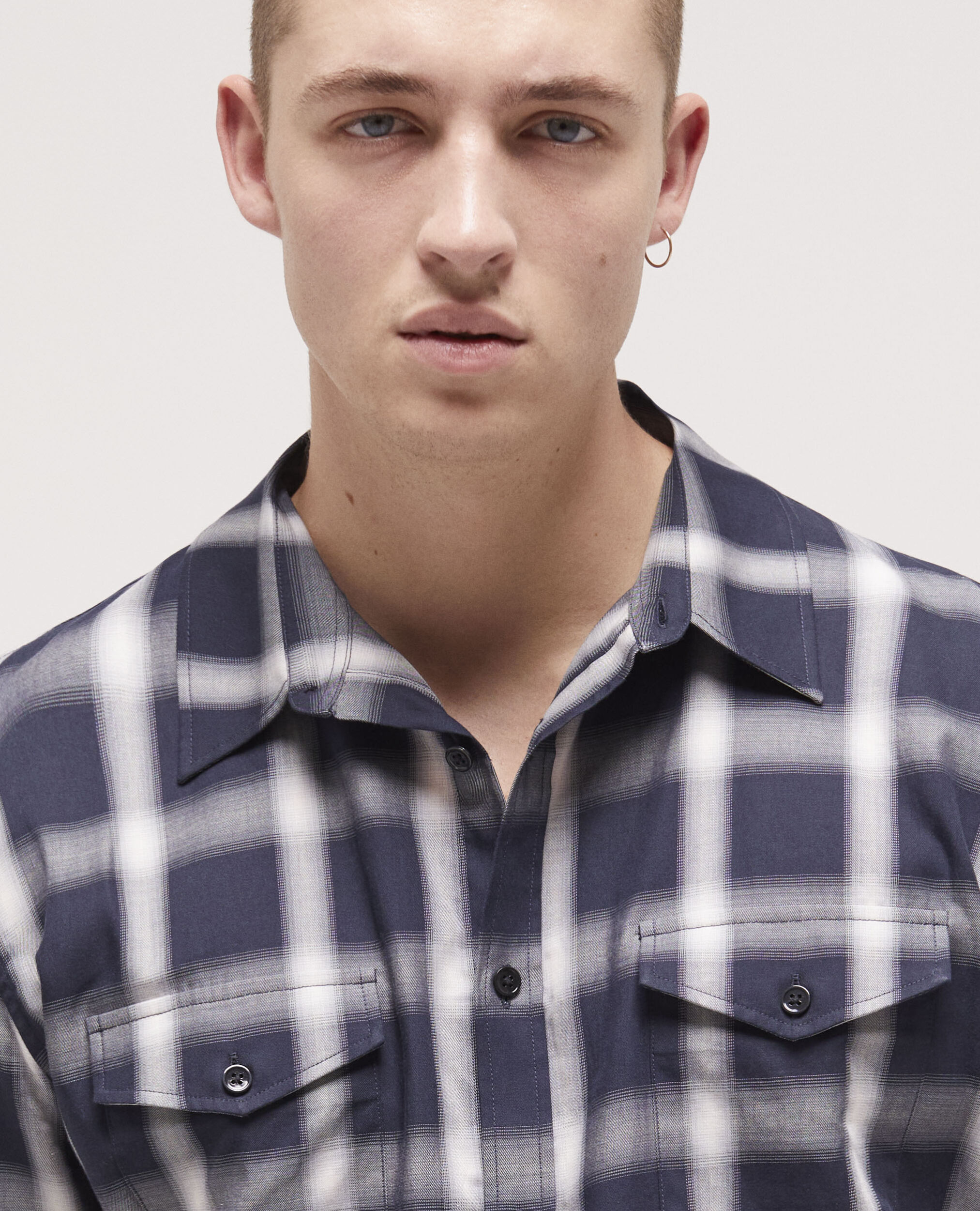 Chemise à carreaux et poches