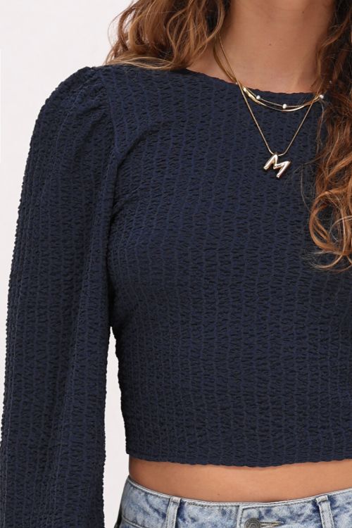 Donkerblauwe top met structuur & strik