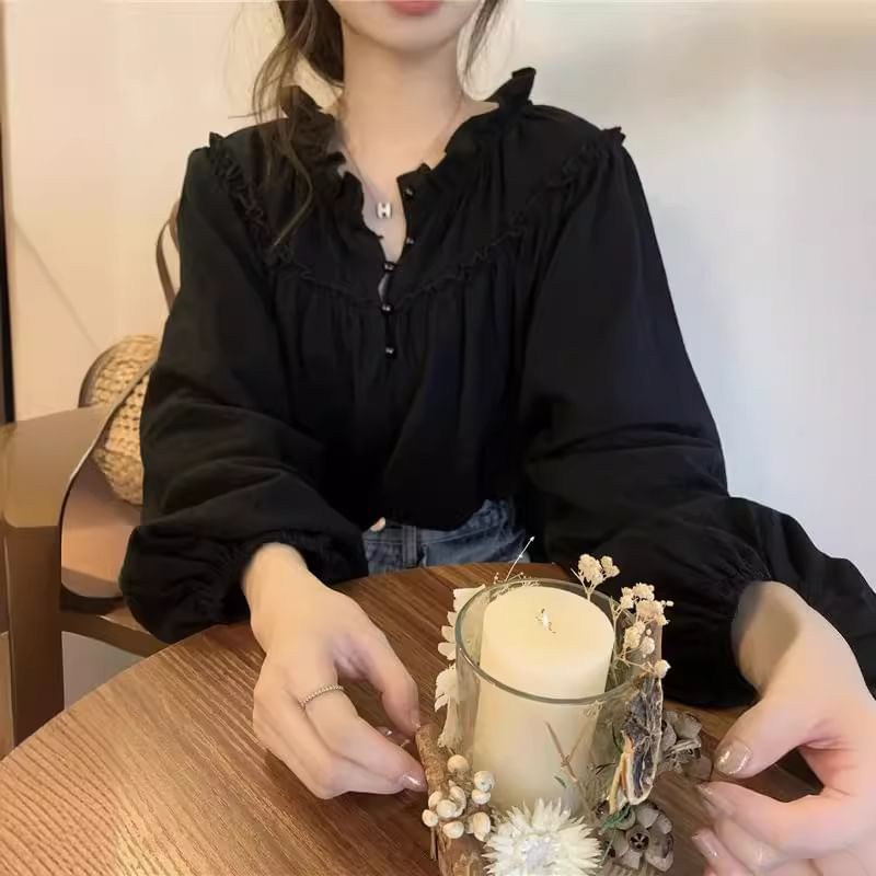 Sienne - Effen blouse met V-hals en ruches