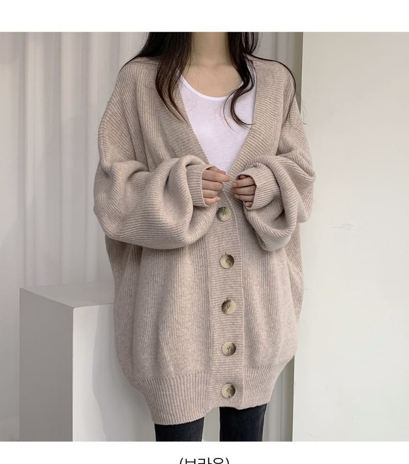 Frigga - V-hals effen oversized vest met knoopjes