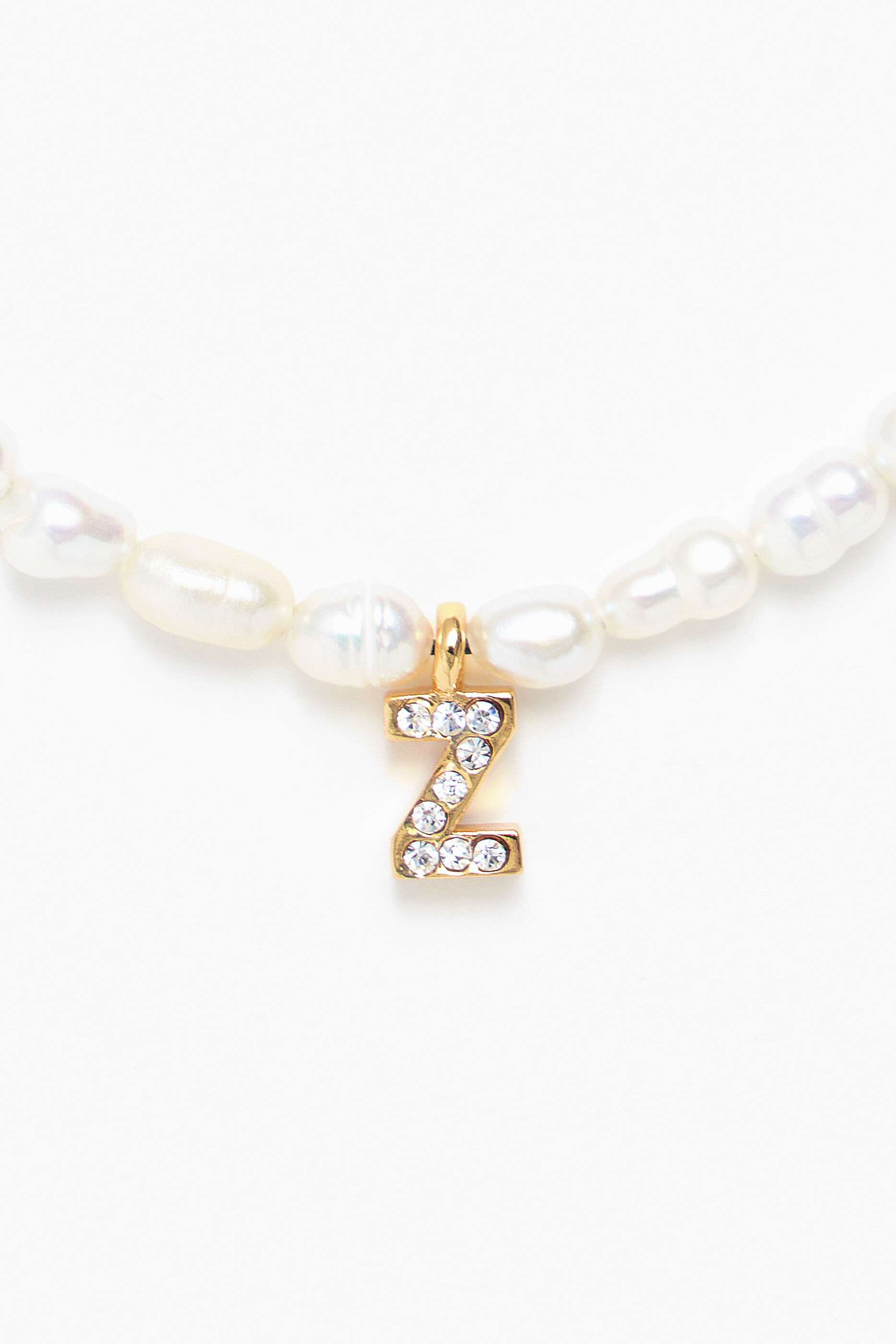 Pulseira de pérolas com a letra Z