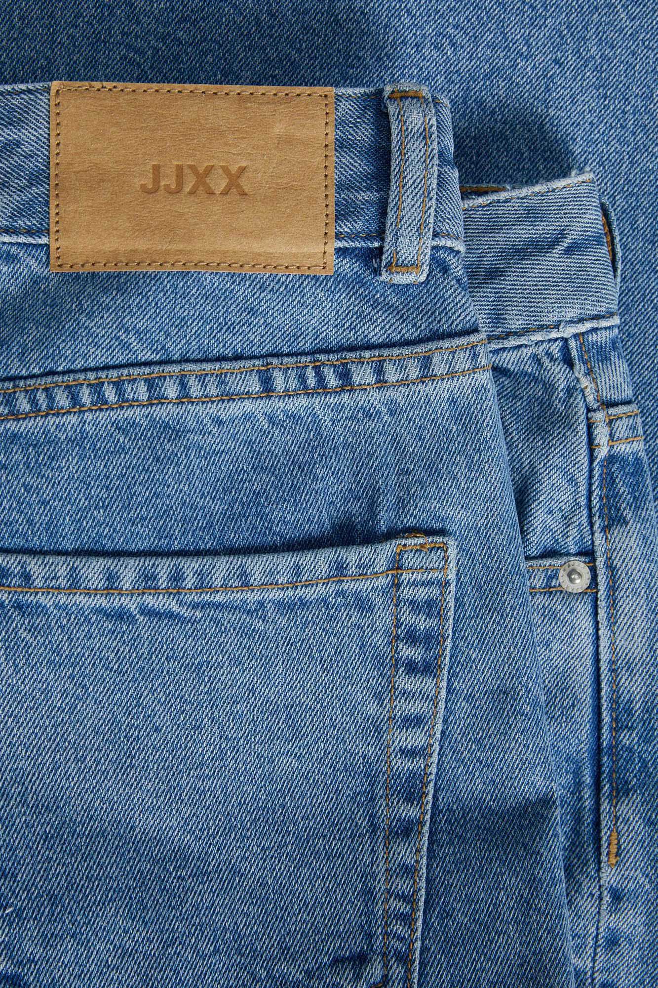 Calça jeans de perna larga com rasgos