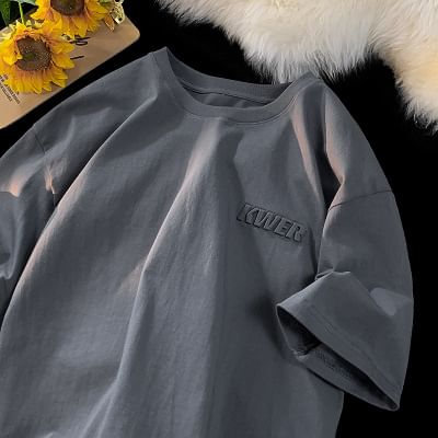 FOEV - T-shirt met ronde hals en elleboogmouwen en belettering