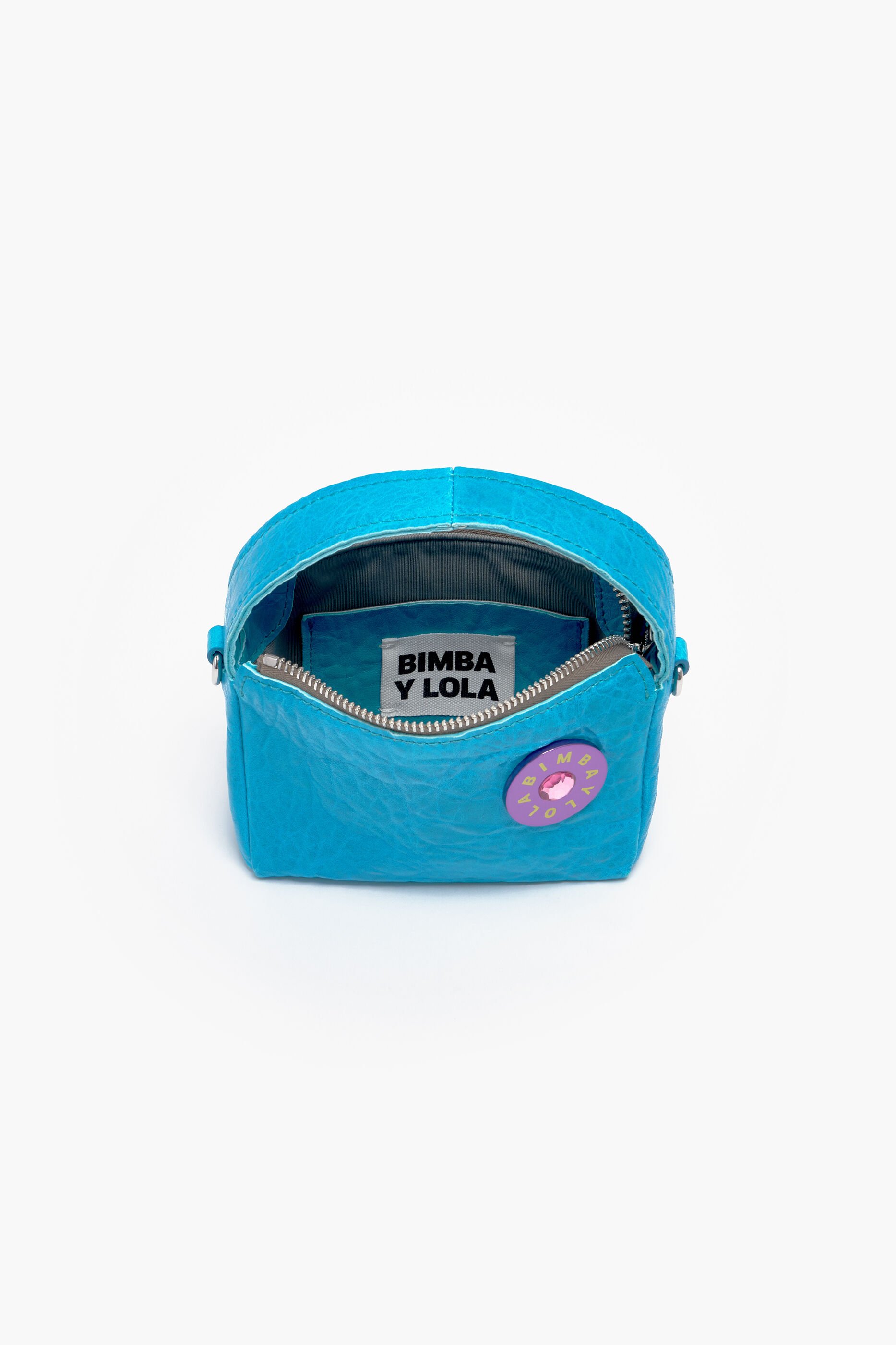 Bolsa hobo tamanho XS em couro resistente à água.