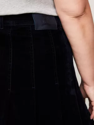 Minissaia plissada de veludo e jeans da Curve