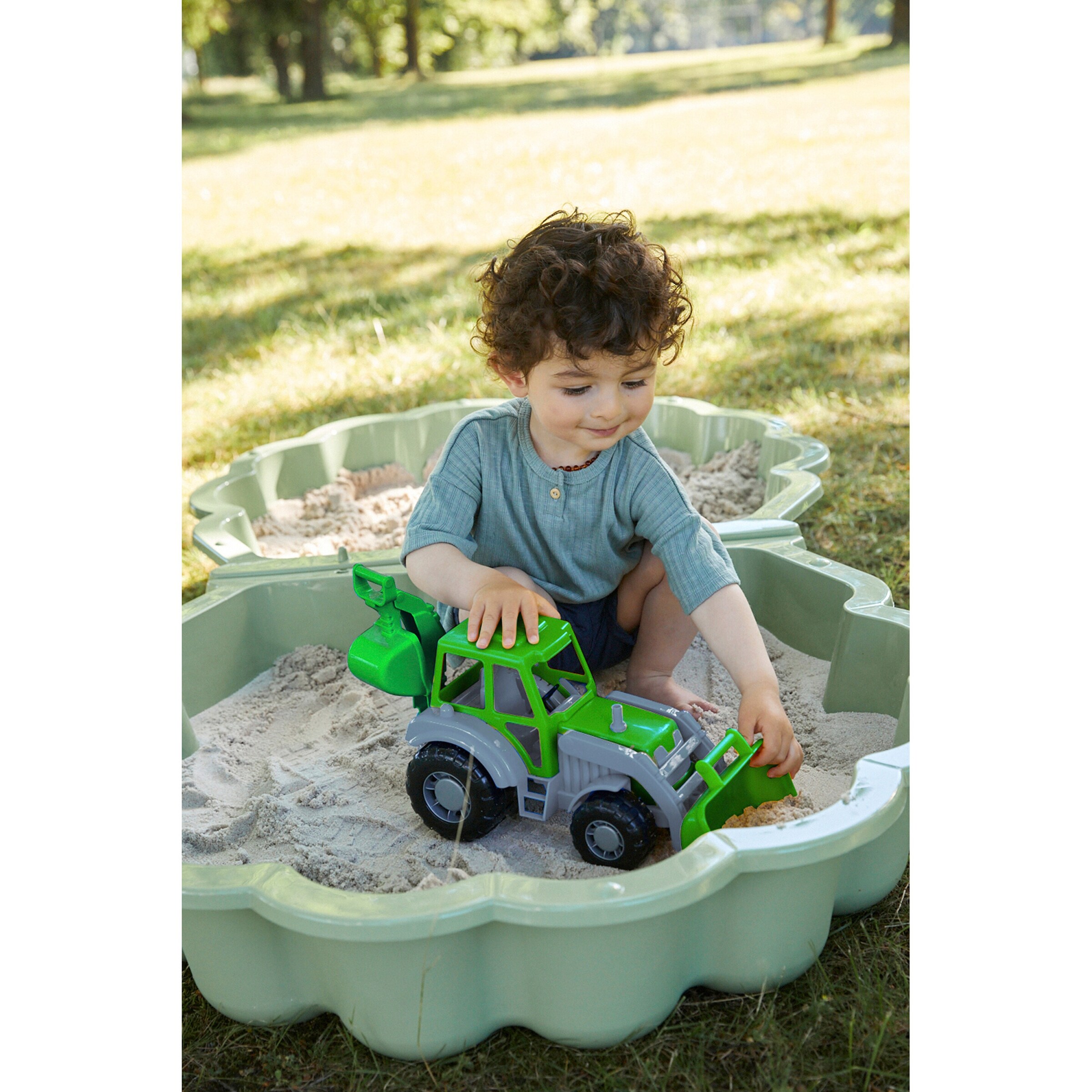 solini Traktor mit Heckbagger