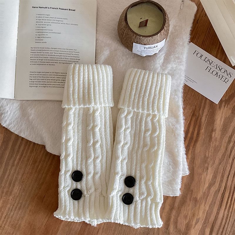 MOGLA - Gebreide beenwarmers met knoopaccent