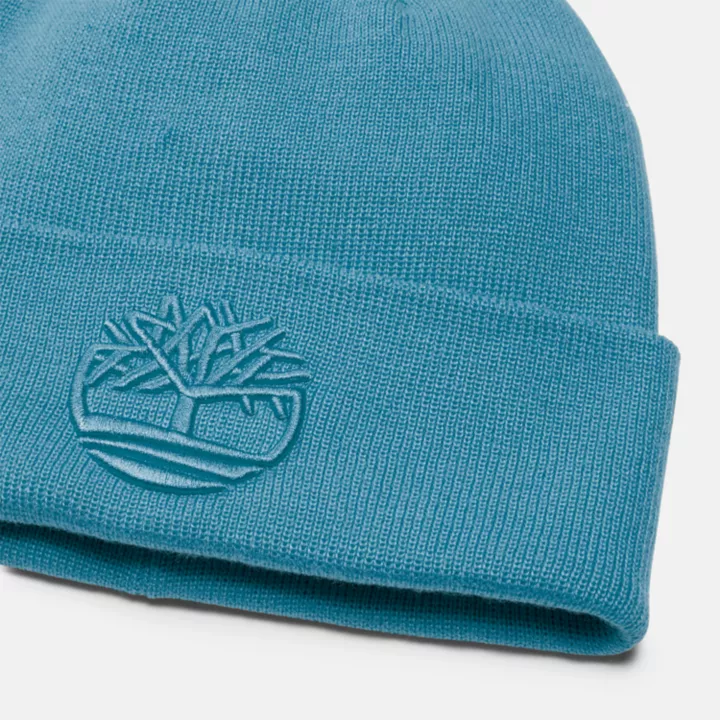 Gorro masculino azul com bordado 3D tonal.