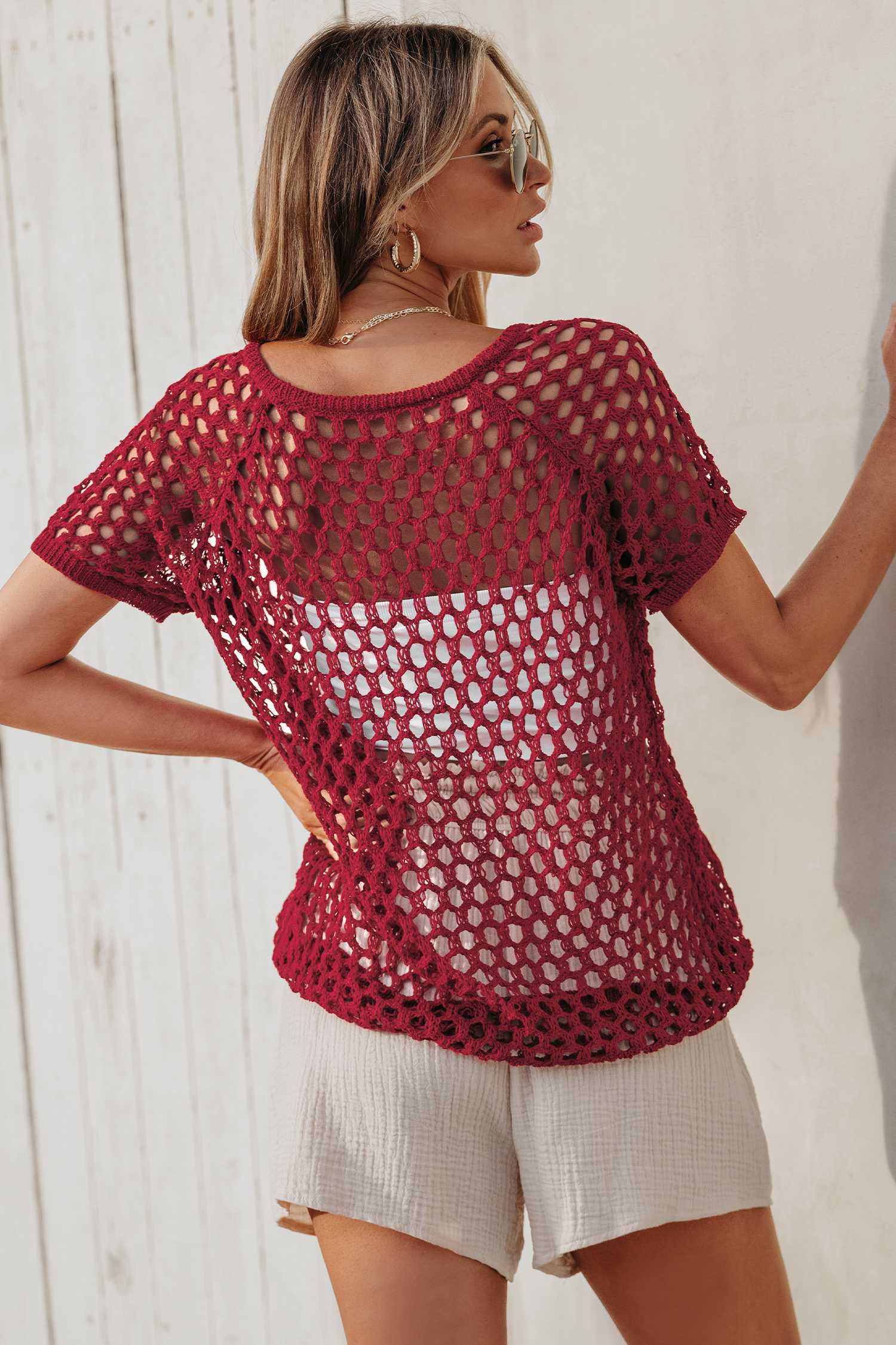Haut cover up en tricot ouvert à boutons sur le devant