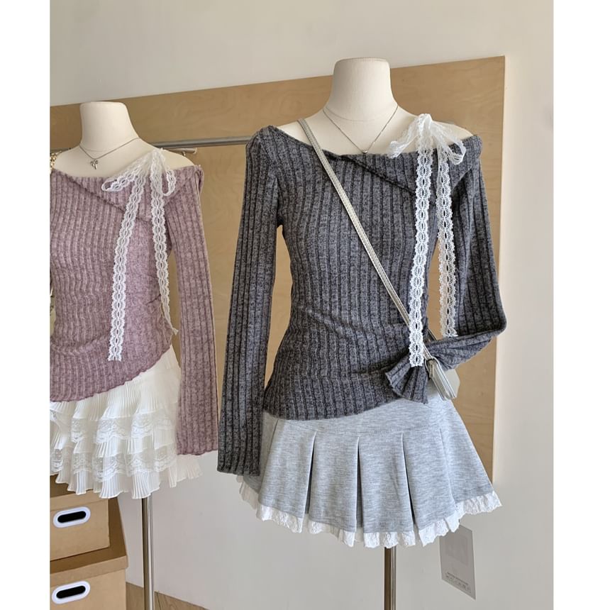Dute - Asymmetrisch gebreide top met lange mouwen en boothals