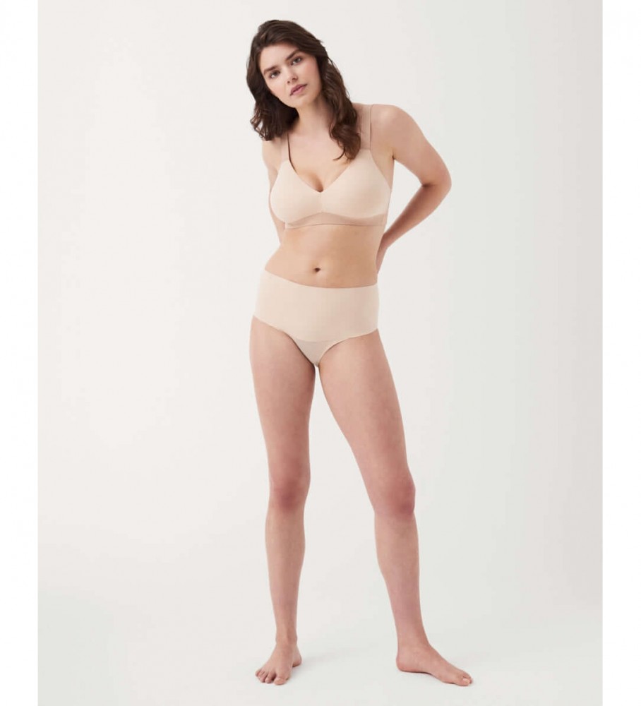 Calcinha modeladora sem costura de cintura alta SPANX na cor nude.