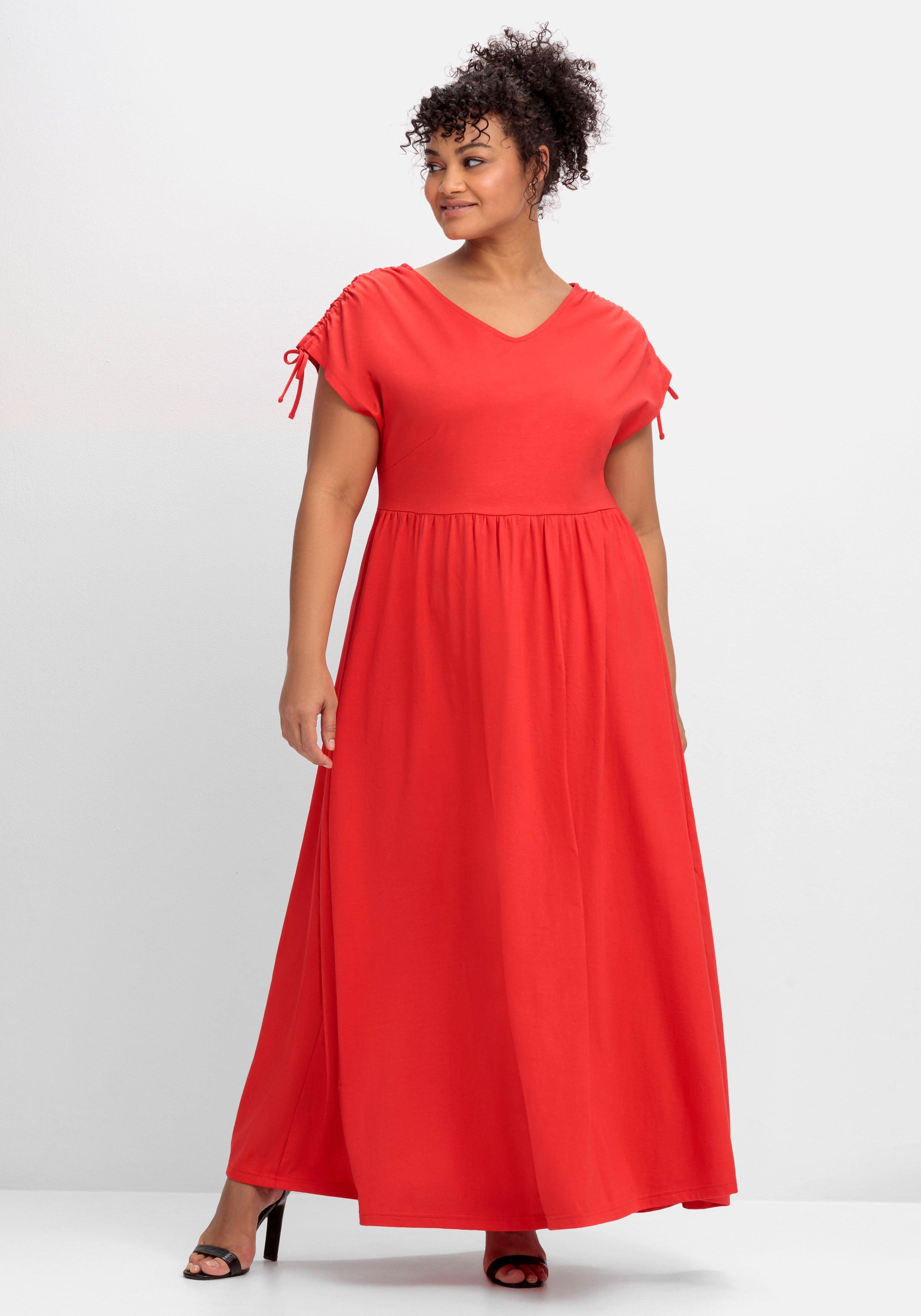Jerseykleid mit weitem Rock und V-Ausschnitt