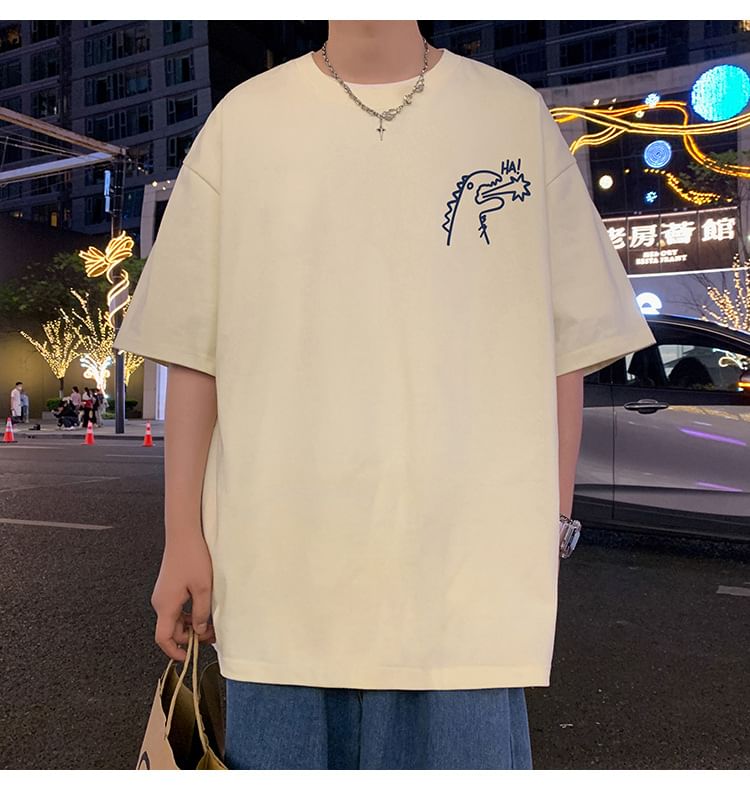 Wolfkane - Oversized T-shirt met korte mouwen, ronde hals en dinosaurusprint