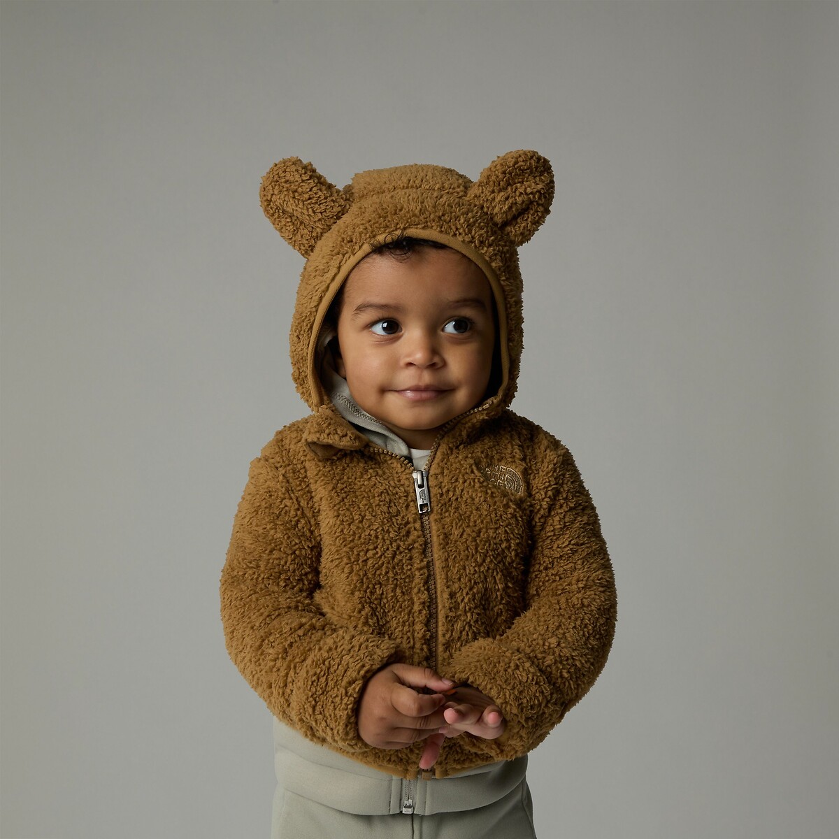 THE NORTH FACE<br>Moletom com capuz em sherpa