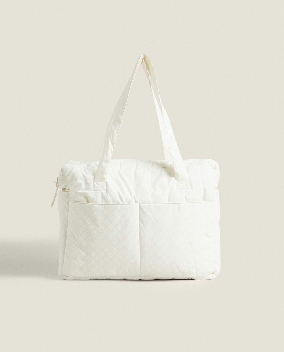 BOLSA DE MATERNIDADE COM ESTAMPA FLORAL