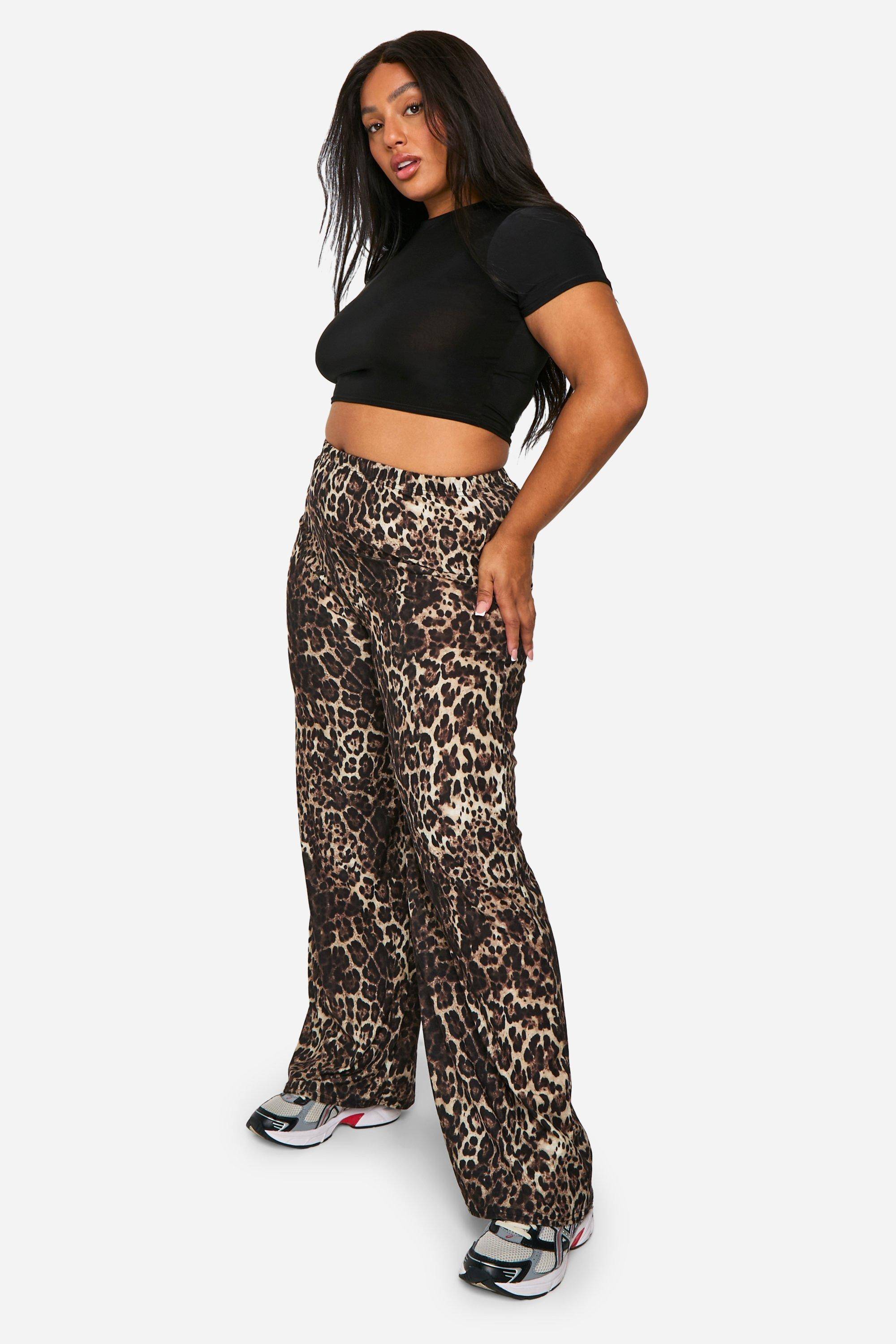 boohoo Grande taille - Pantalon large en jersey à imprimé léopard