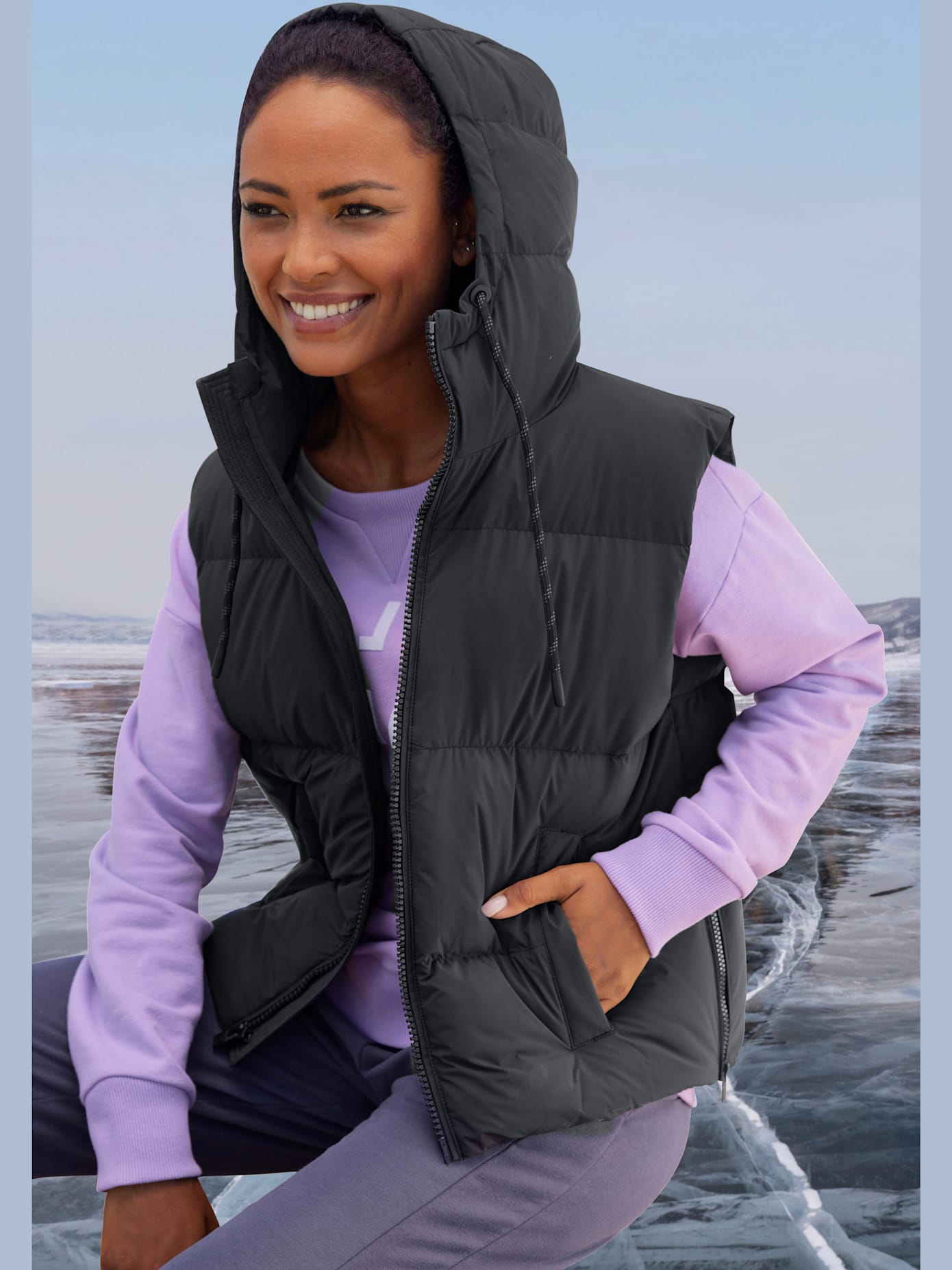 Gilet matelassé doublé avec capuche réglable