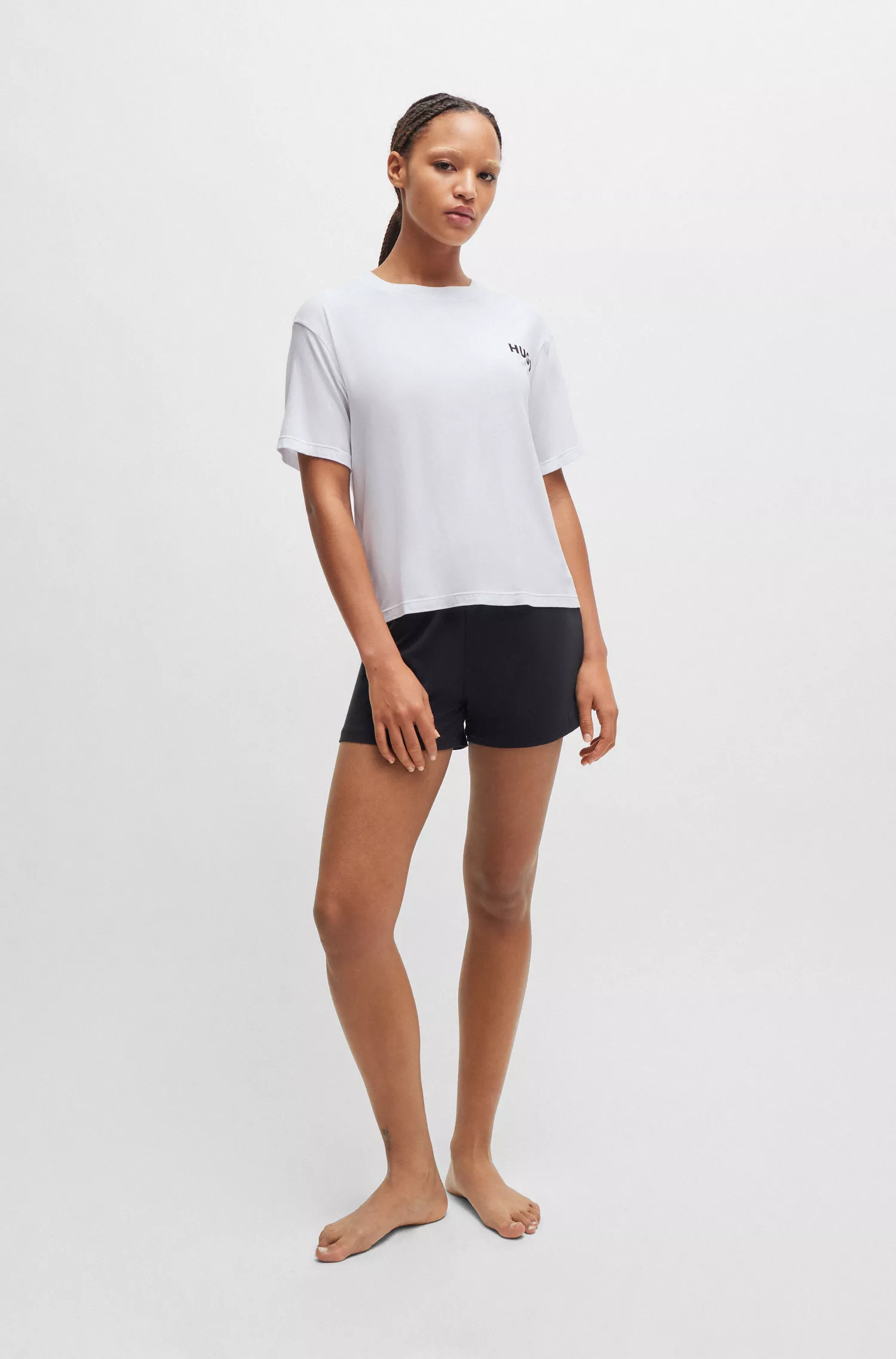 Camiseta de pijama HUGO vermelha, modelagem relaxada, com logotipo estampado.