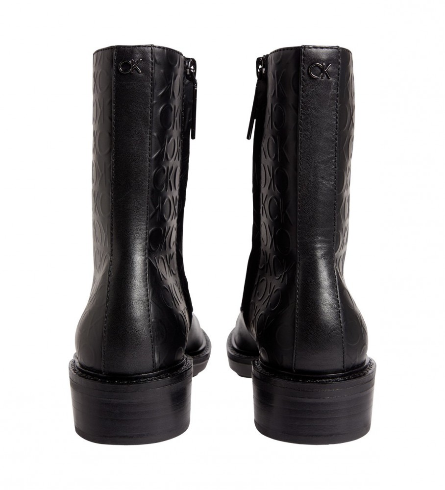 Botas de combate Calvin Klein com sola de borracha, em couro, pretas.