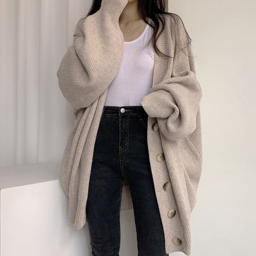 Angel Shine - Oversized V-hals vest met bubbelmouwen
