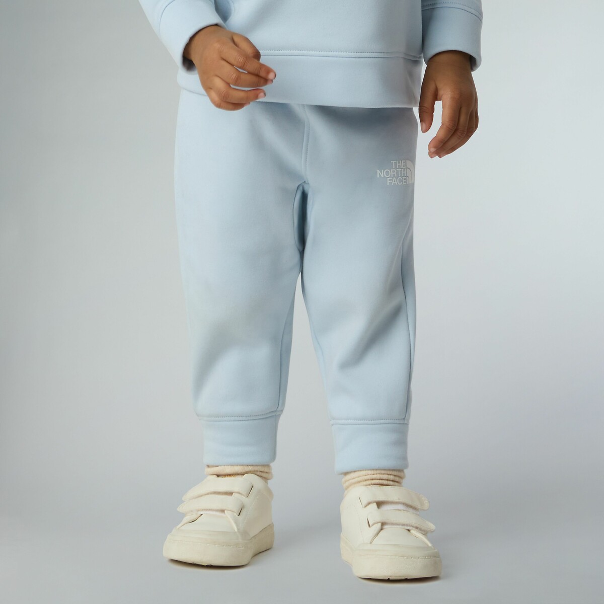 THE NORTH FACE<br>Treino com suéter e calça de fleece