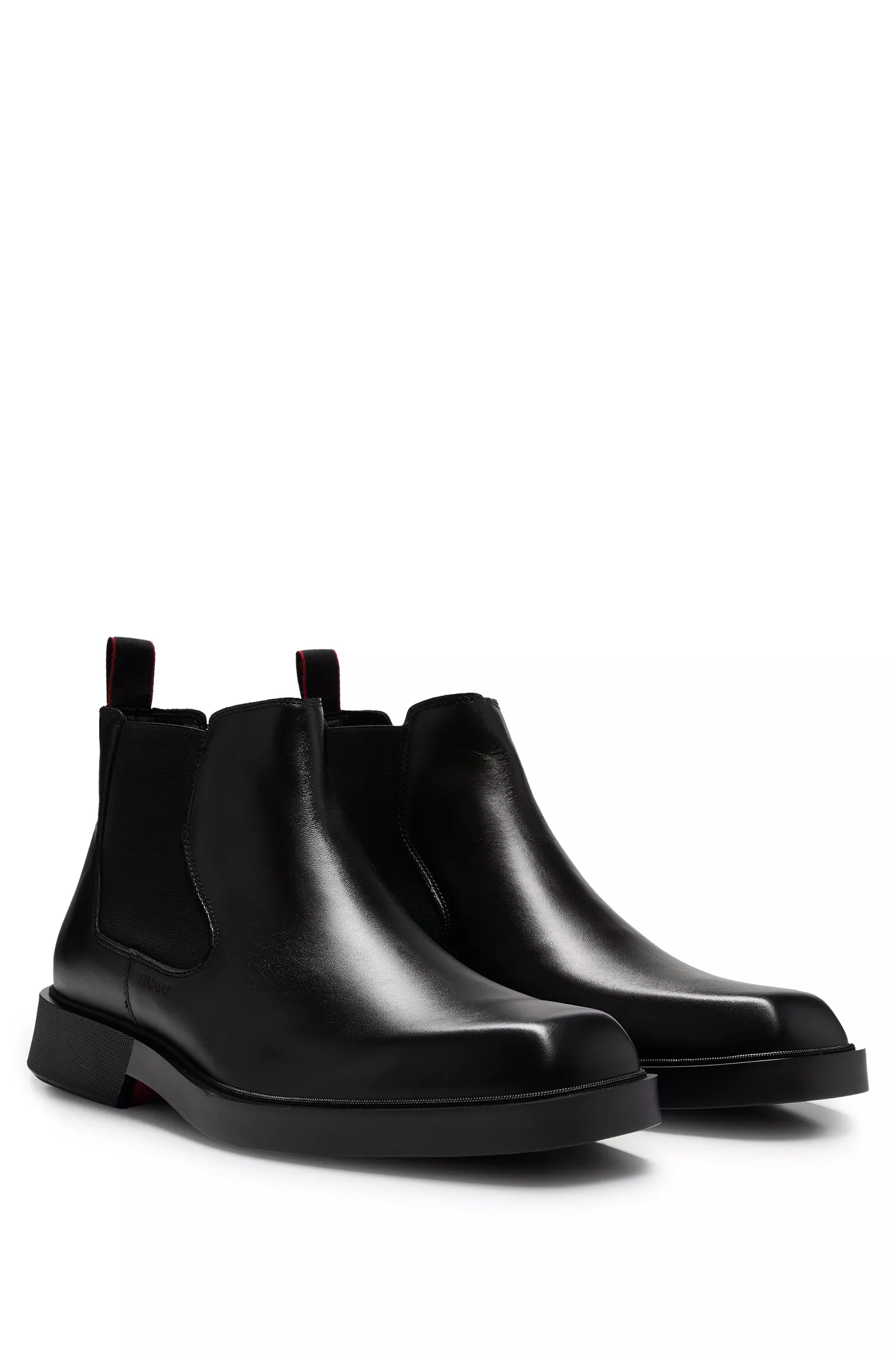 Botas Chelsea HUGO em couro vermelho com alça de puxar exclusiva.