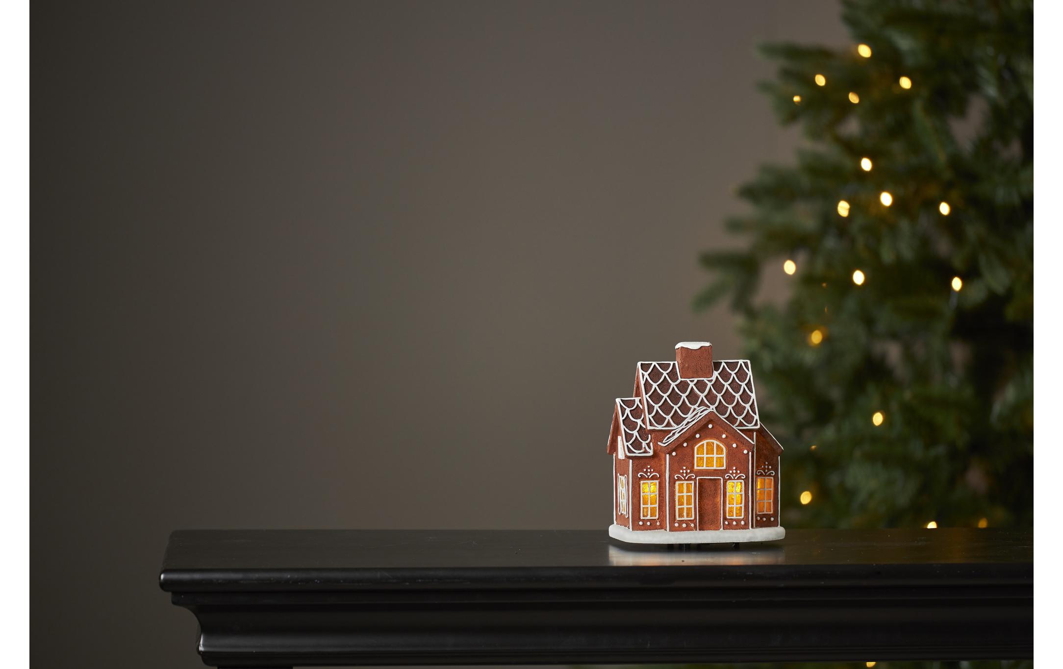 Dekorativer Szenerie Gingerville, WarmweissDekoratives Lebkuchenhaus mit warmweissem Licht und Timerfunktion
