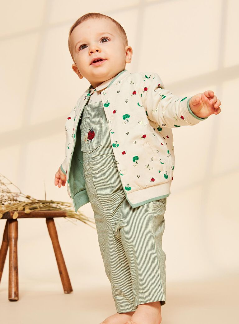 Gilet réversible vert et vanille en molleton style varsity