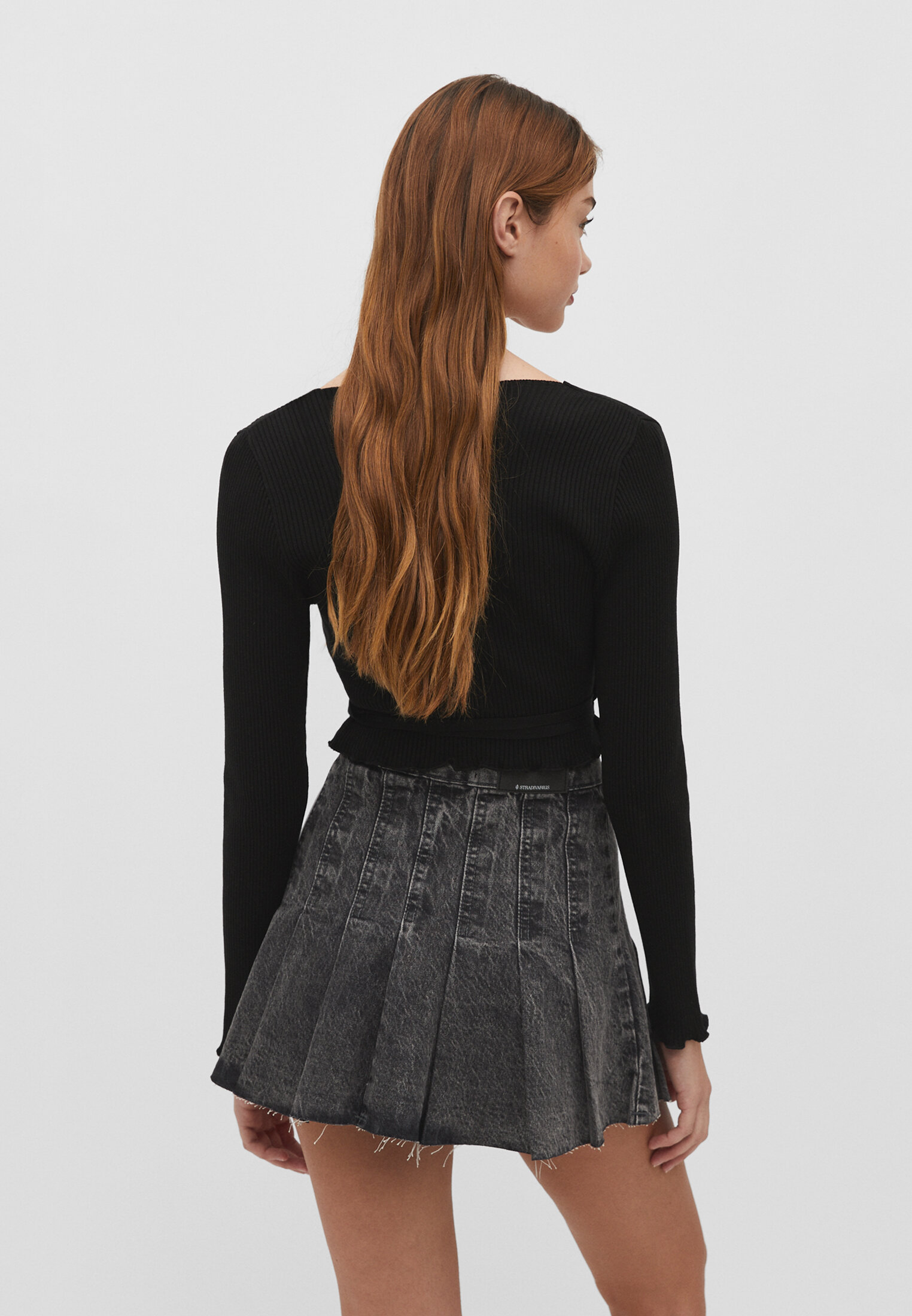 Minissaia jeans com pregas