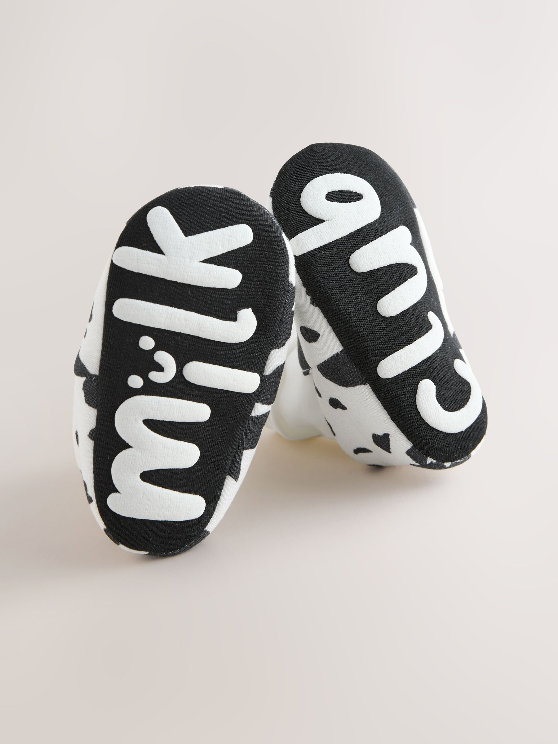 Wit/Zwart Koeienprint - Babyschoenen met sok-bovenkant (0-18mnd)
