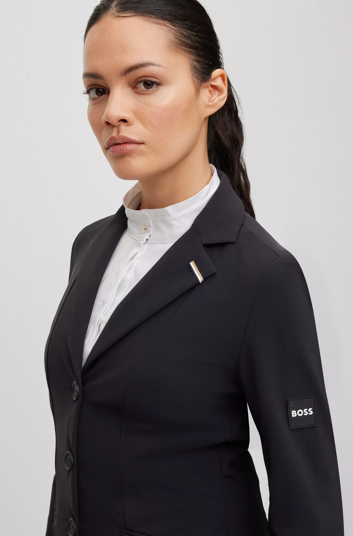 Jaqueta de competição BOSS Black-Equestrian slim-fit em tecido power stretch.
