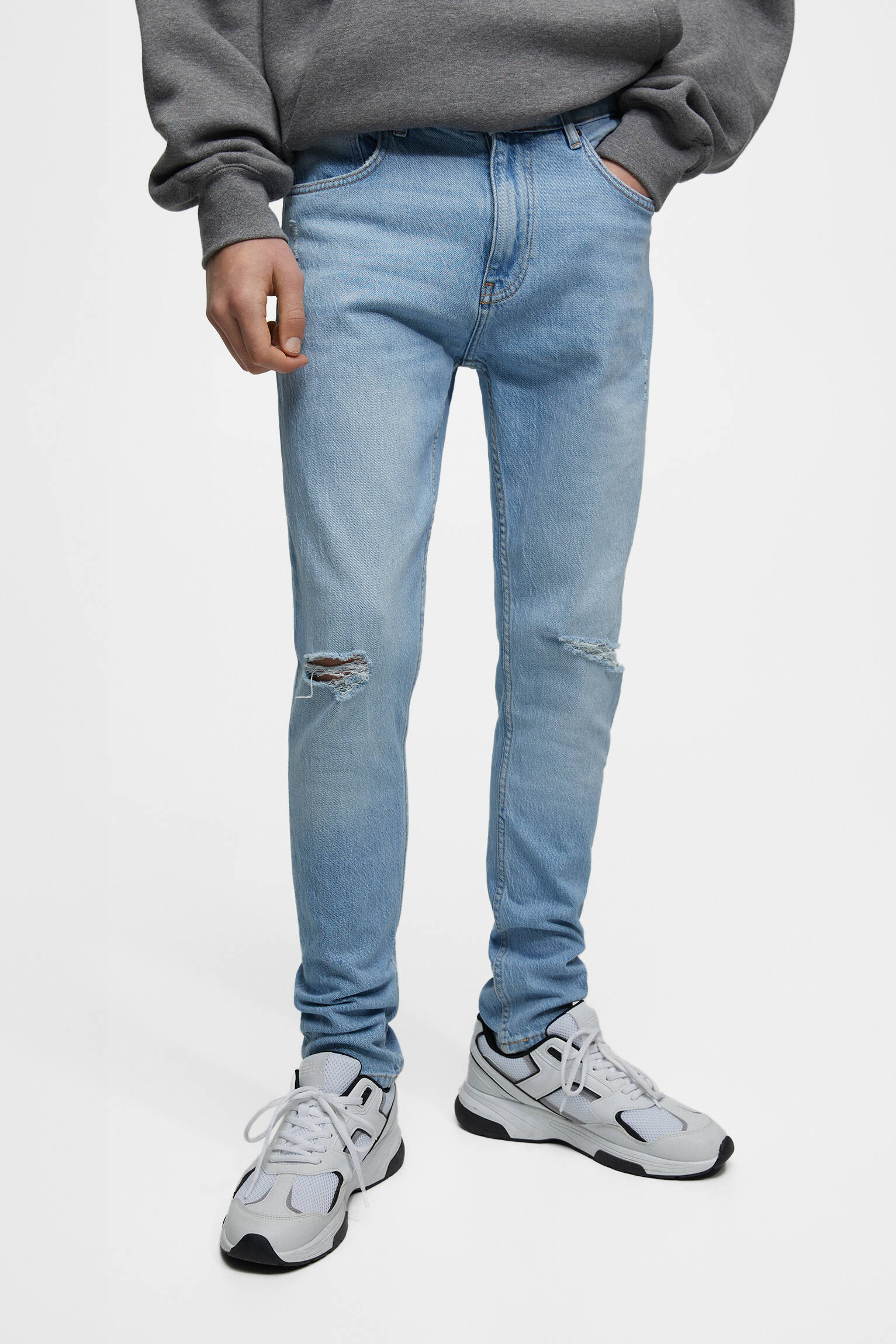 CALÇA JEANS SKINNY RASGADA - ÍNDIGO CLARO