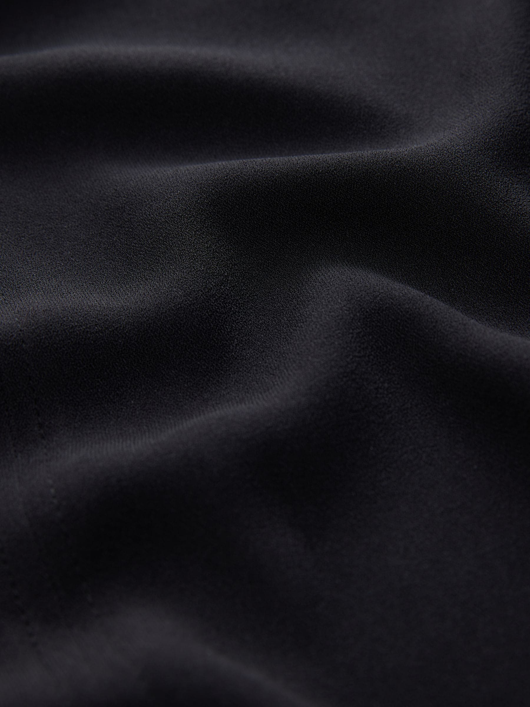 Zwart - Blouse met V-hals en lange mouwen