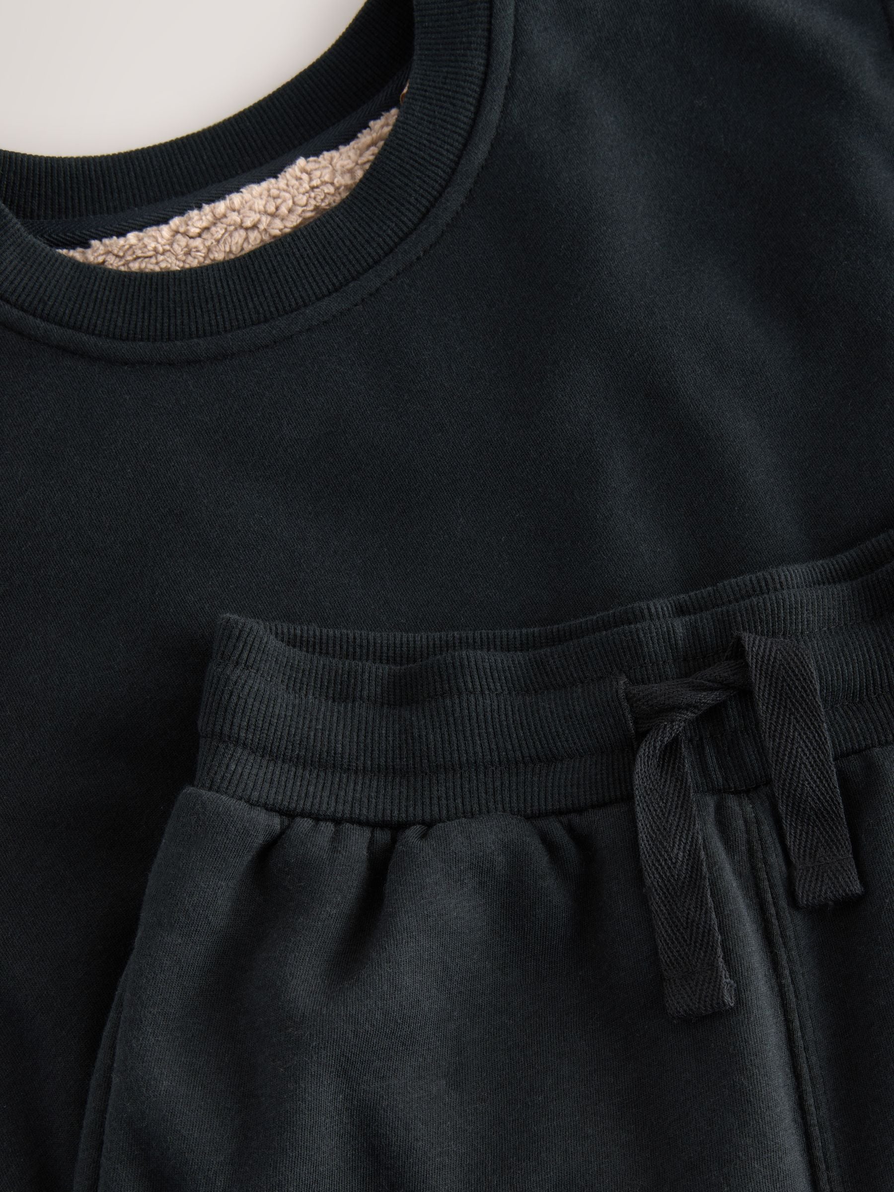Zwart - Enkele behaaglijke fleece pyjama (3 - 16 jr)
