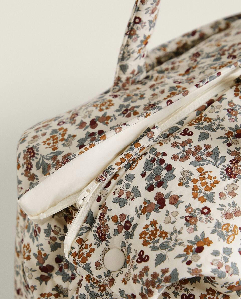 Bolsa de maternidade infantil em tecido com estampa floral