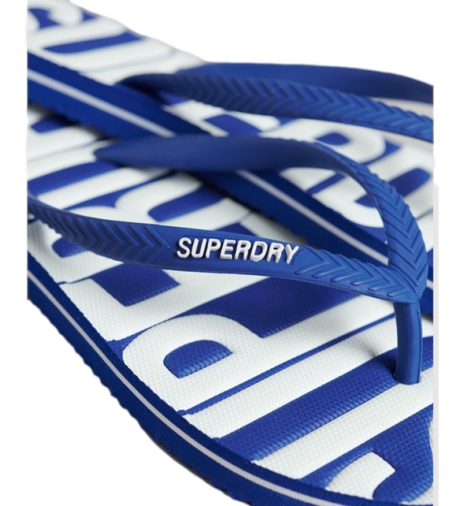 Chinelo vegano Superdry com logo vintage, azul.