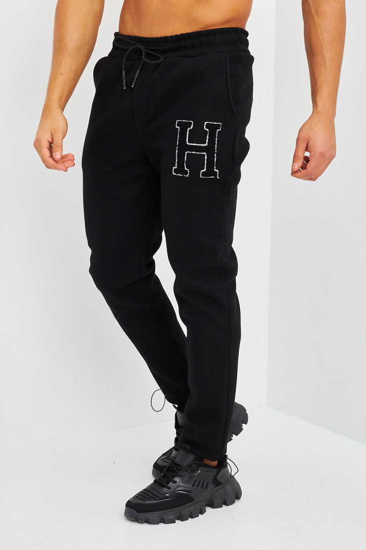 Pantalon type jogging noir à inscription H