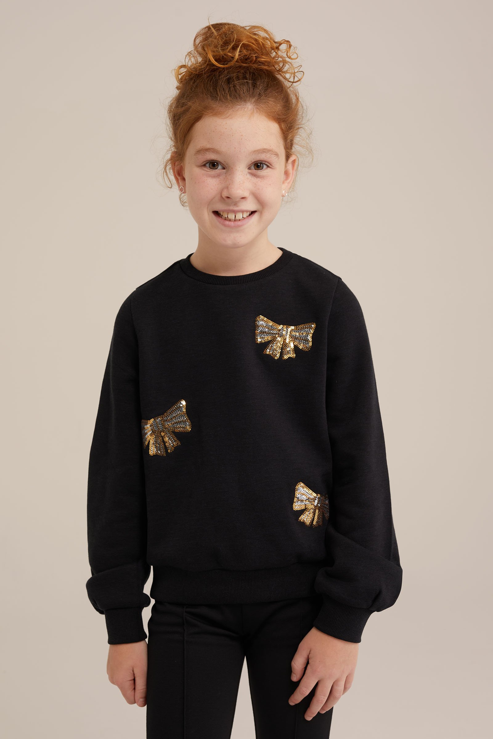Meisjes sweater met pailletten applicatie WE Fashion Zwart