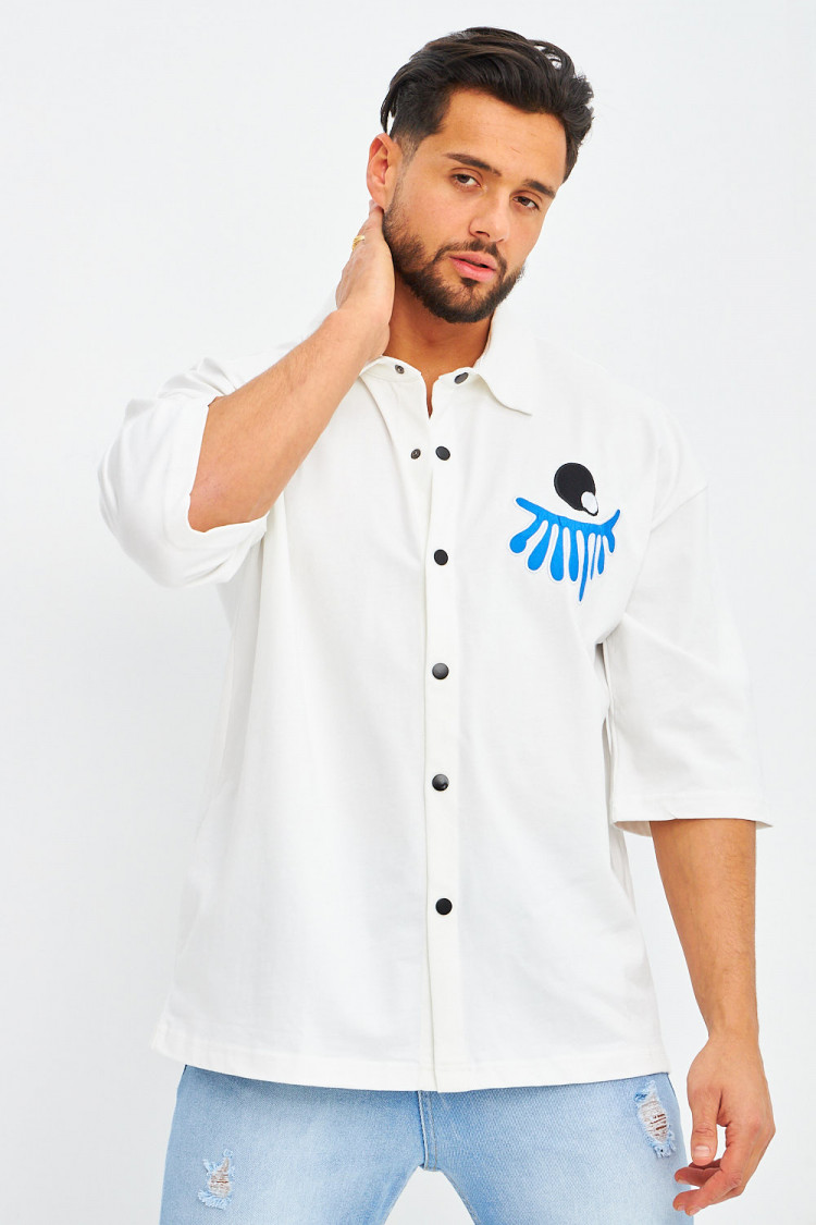 Chemise blanche oversize à patchs
