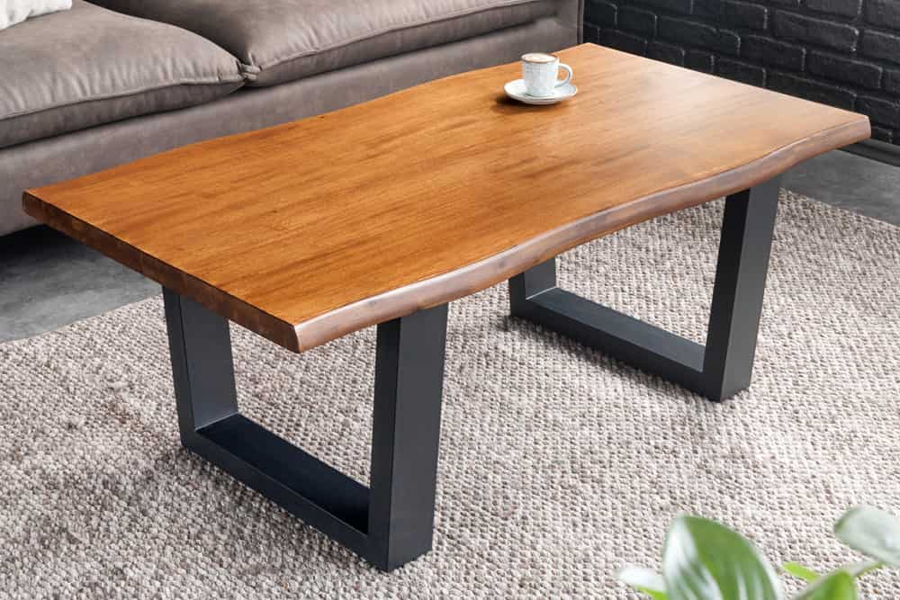 Massiver Couchtisch GENESIS 110cm braun Akazienholz Baumkante V-Gestell