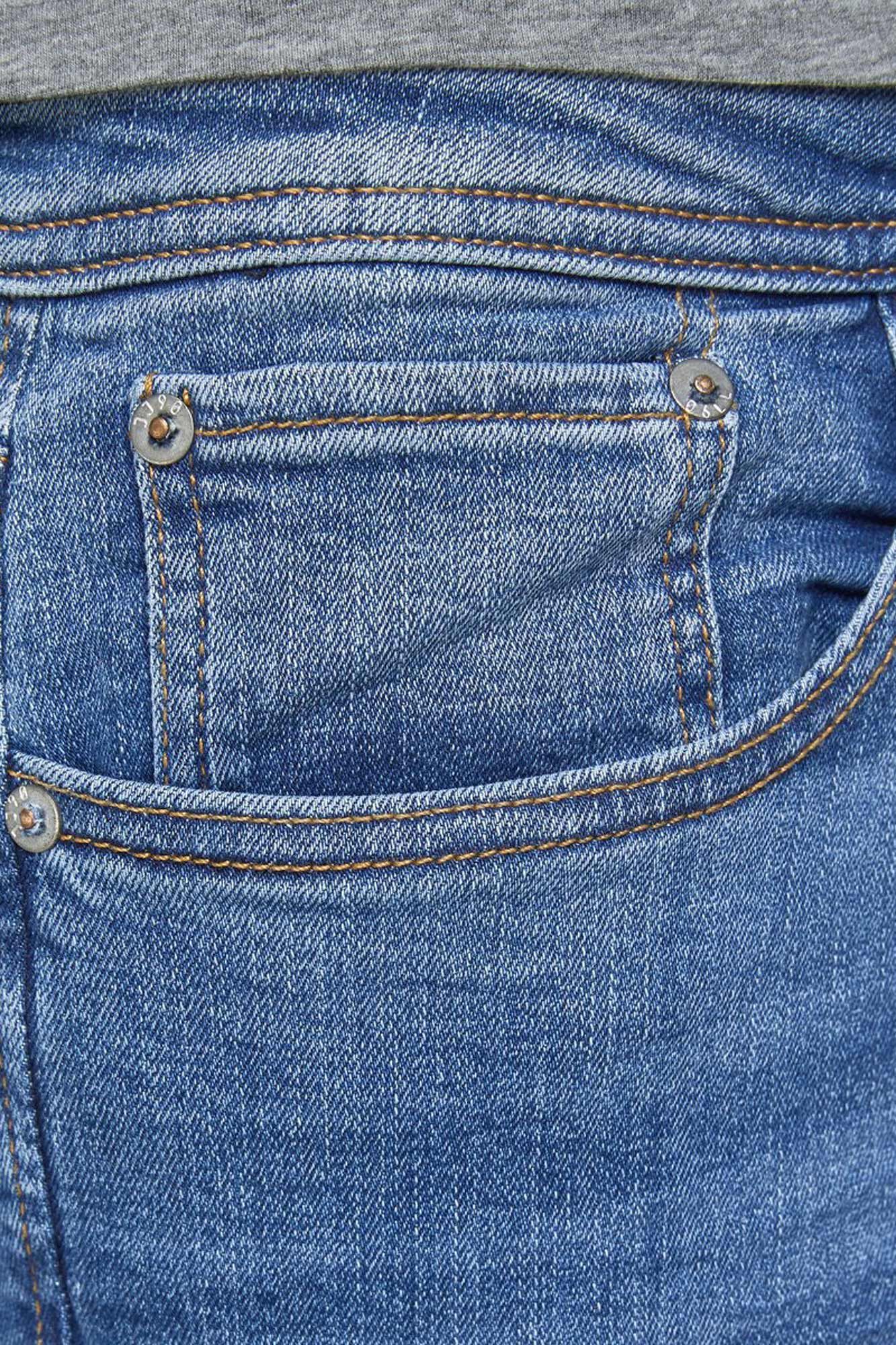 calça jeans de corte justo