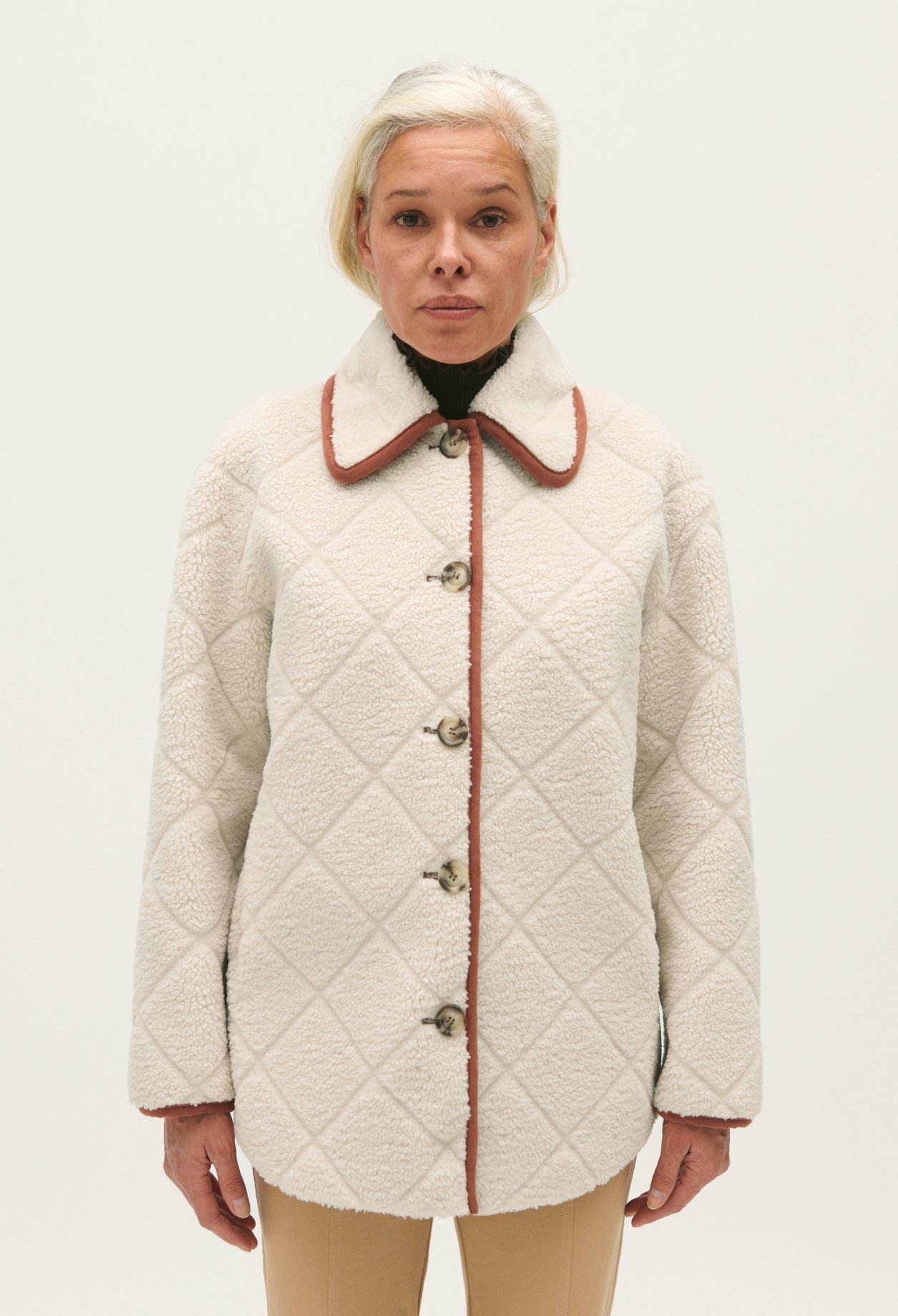 Manteau effet peau lainee