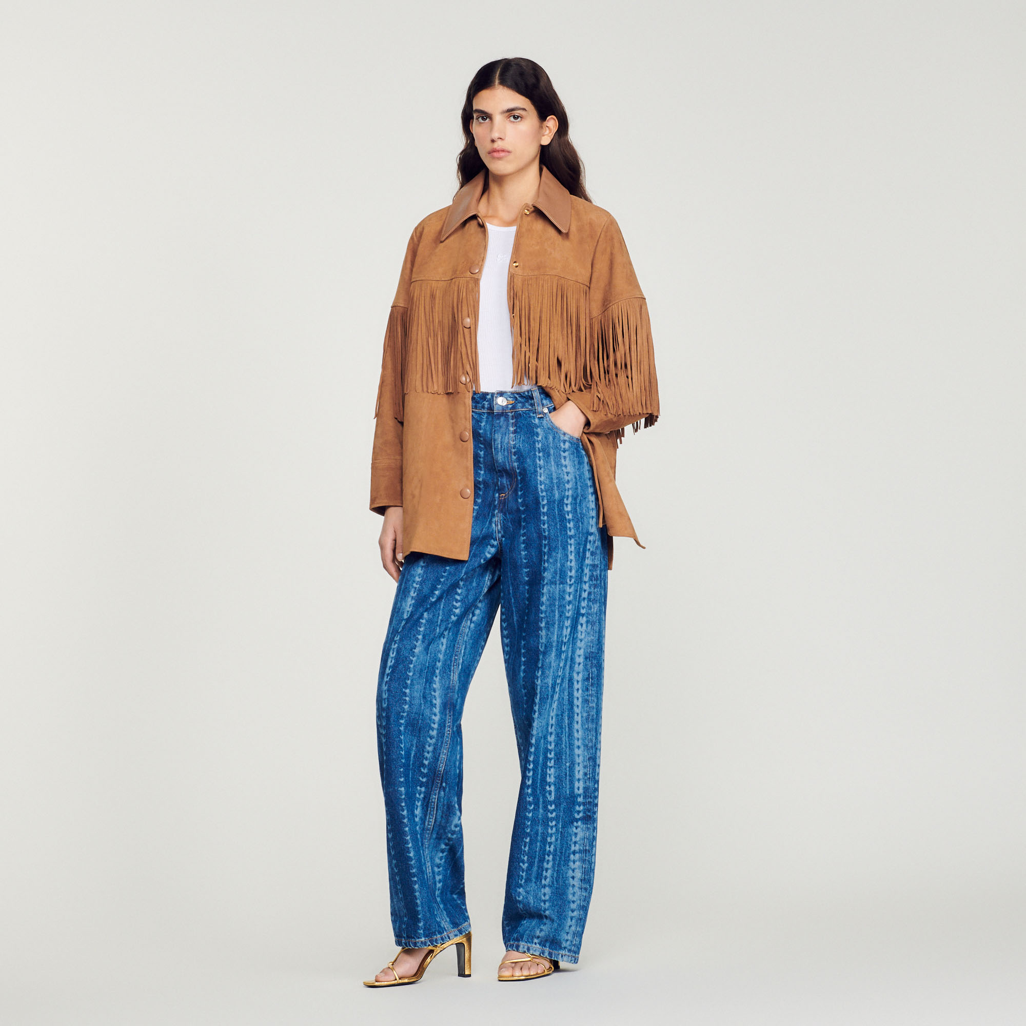 Veste longue en cuir á franges