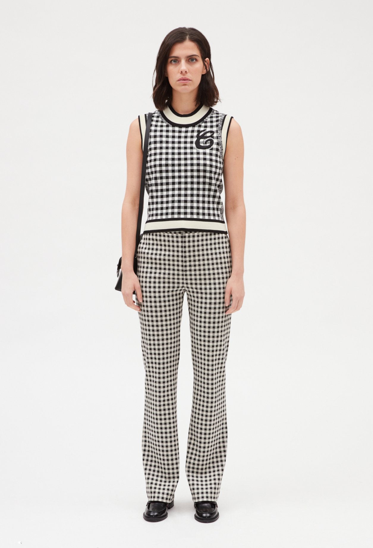 Pull sans manches carreaux bicolore
