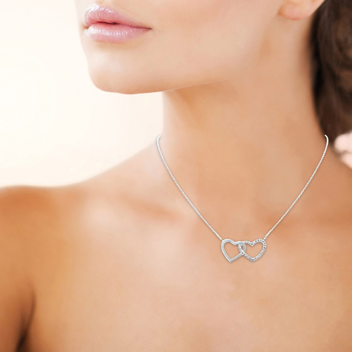 Collier Brillaxis coeurs entrelacés empierrés