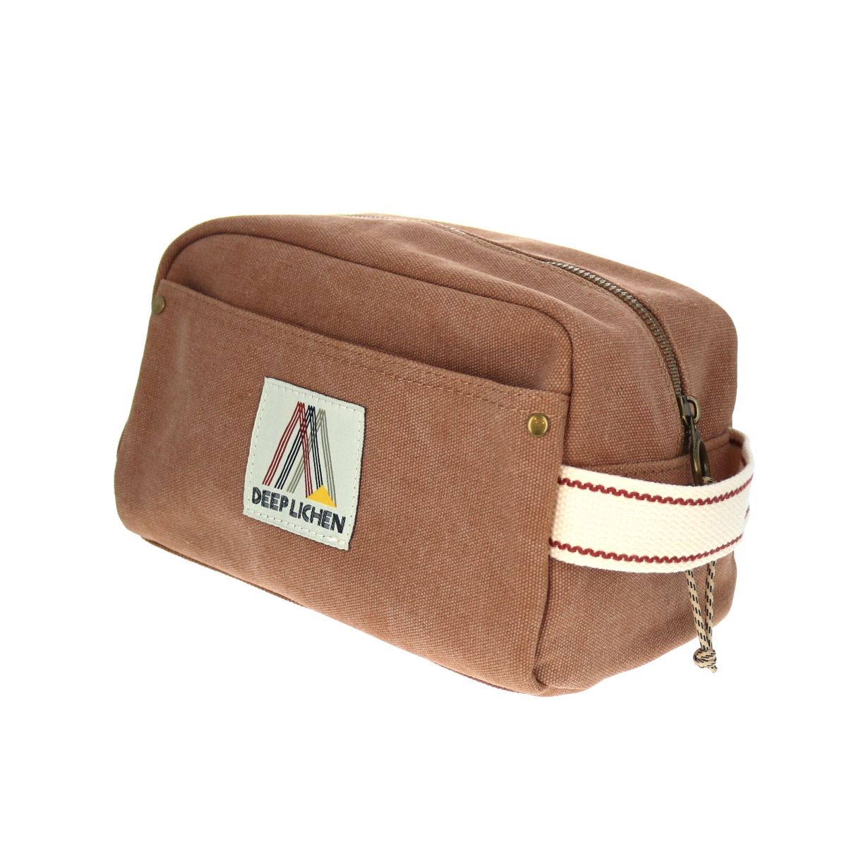 Trousse de toilette en toile marron .