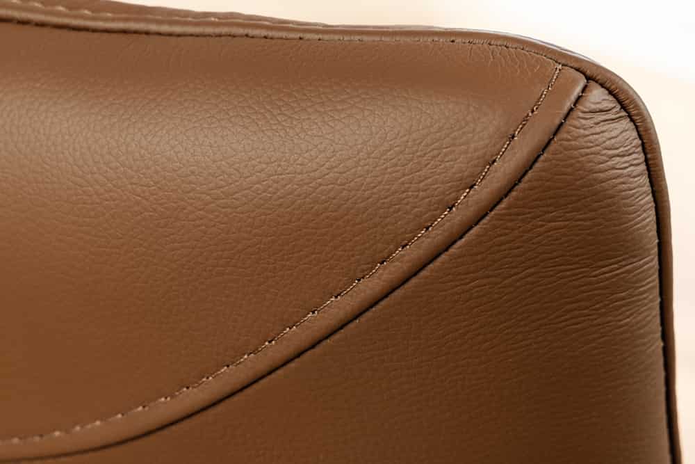 Drehbarer Stuhl SIGNATURE cognac braun Echtleder 360° Taschenfederkern schwarz Metall