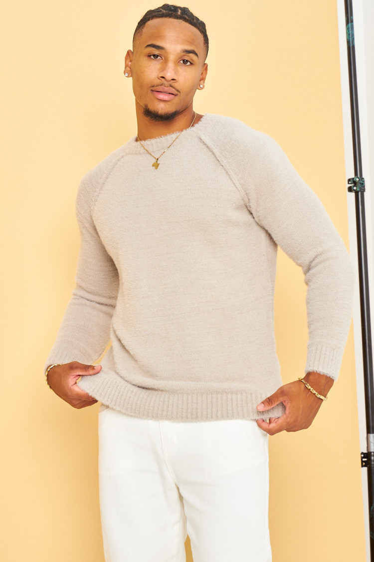 Pull beige en laine à col rond